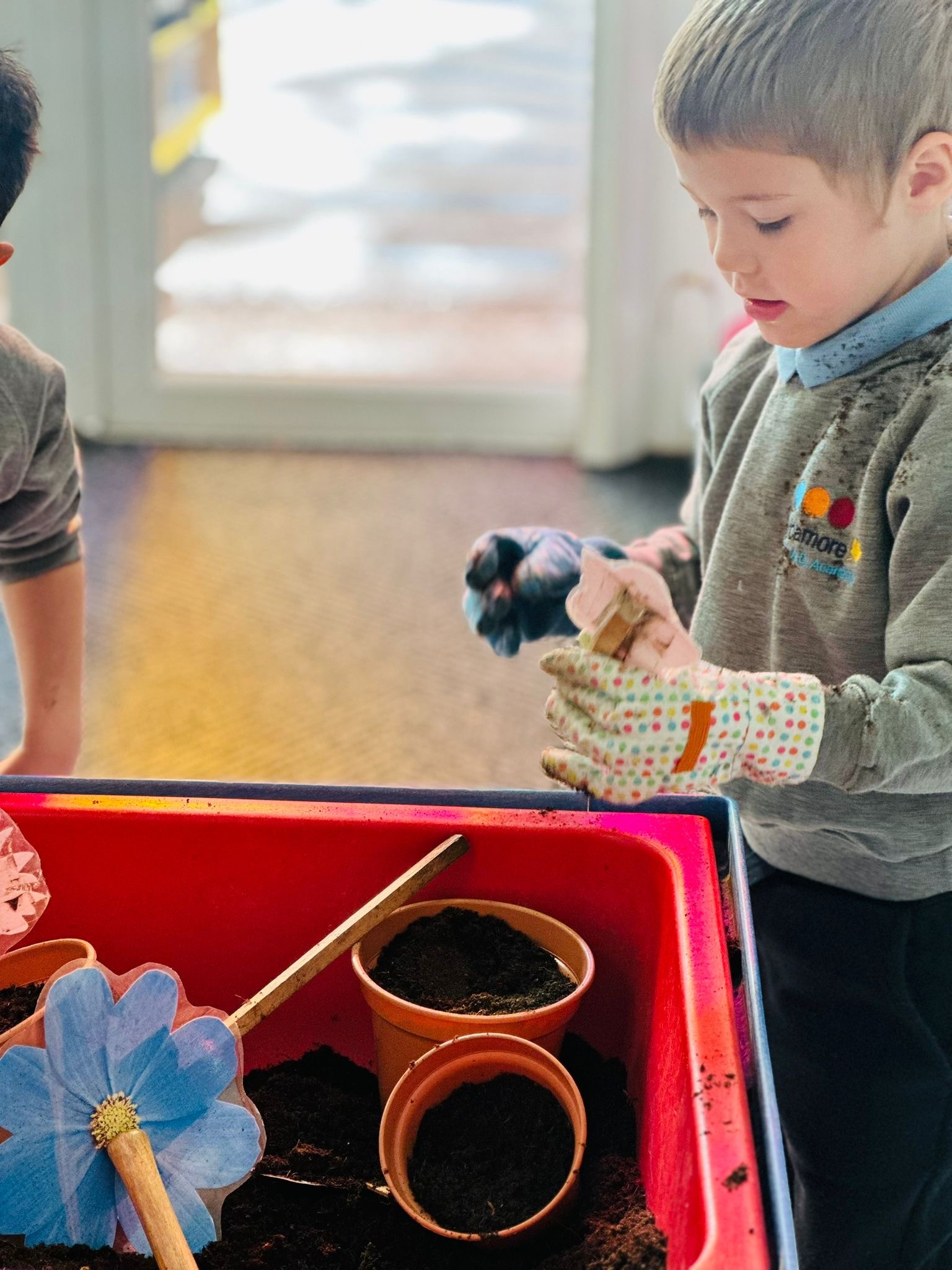 Sycamore Nursery children planting