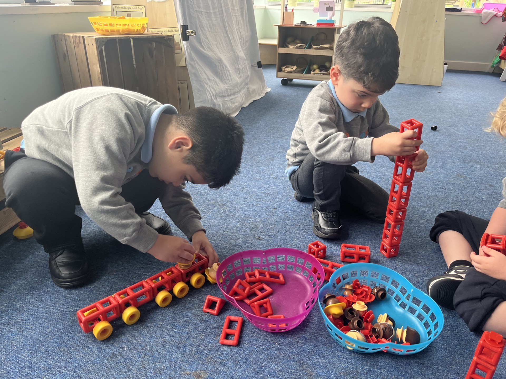 Sycamore Nursery children with building toys